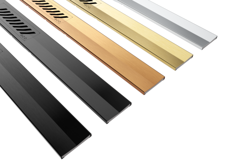 Farbliche Optionen der Duschrinne ACO SE+: Schwarz und Graphit unterstützen moderne, reduzierte Gestaltungsansätze mit klaren Linien, während Gold und Kupfer eine warme Akzentuierung ermöglichen, die sich besonders gut mit Naturstein, Holz oder erdigen Keramiken verbinden lässt.